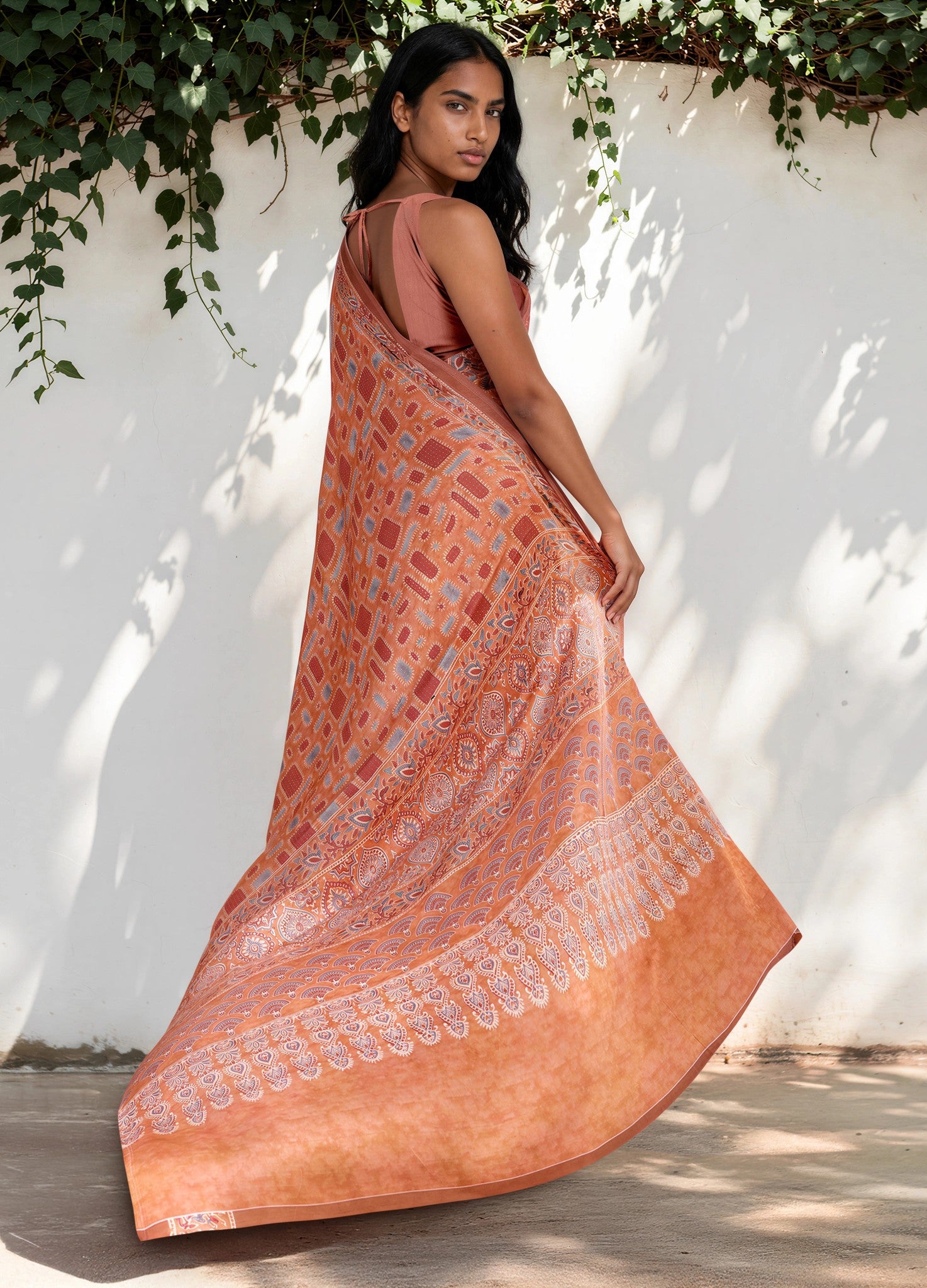 Peach Pink Ethnic Motif Satin Georgette Saree