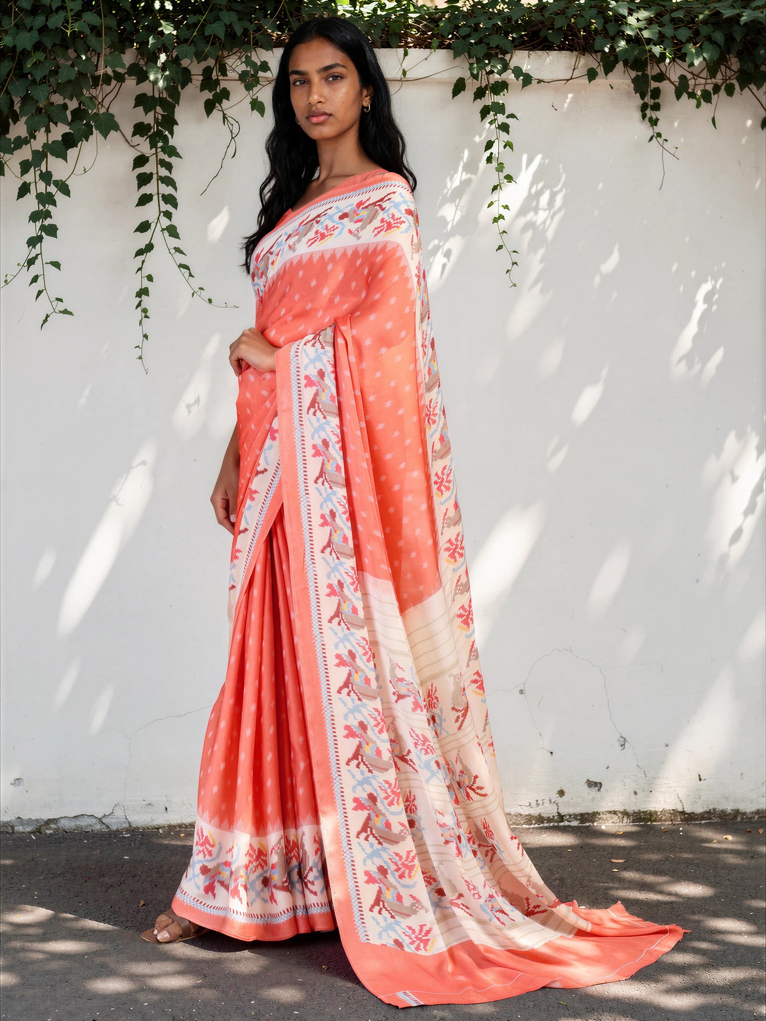 Salmon Pink Ethnic Motif Satin Georgette Saree