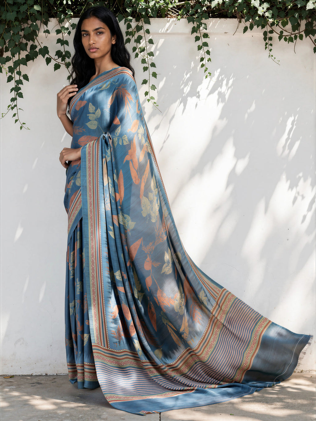 Turquoise Blue Ethnic Motif Satin Georgette Saree