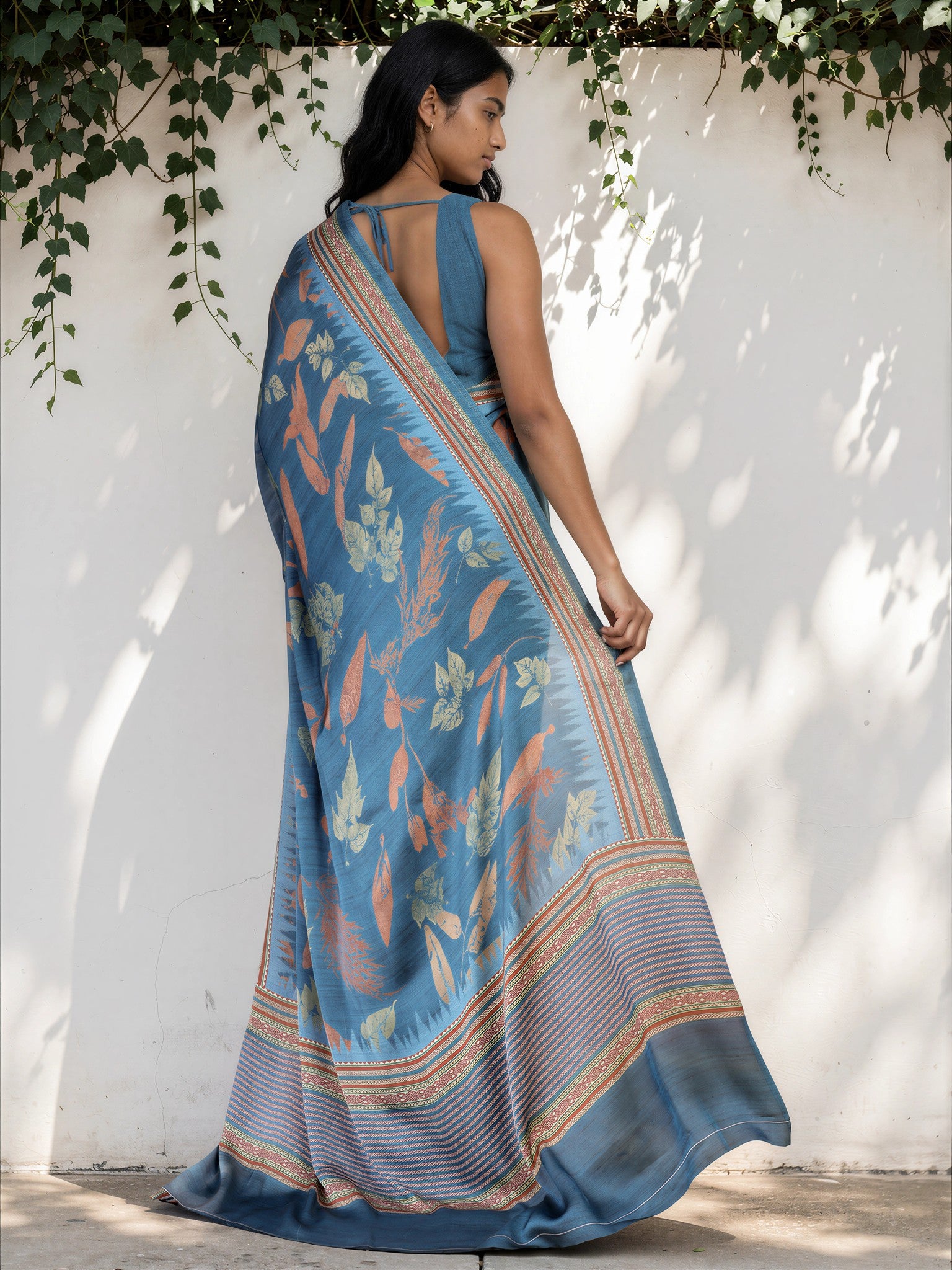 Turquoise Blue Ethnic Motif Satin Georgette Saree
