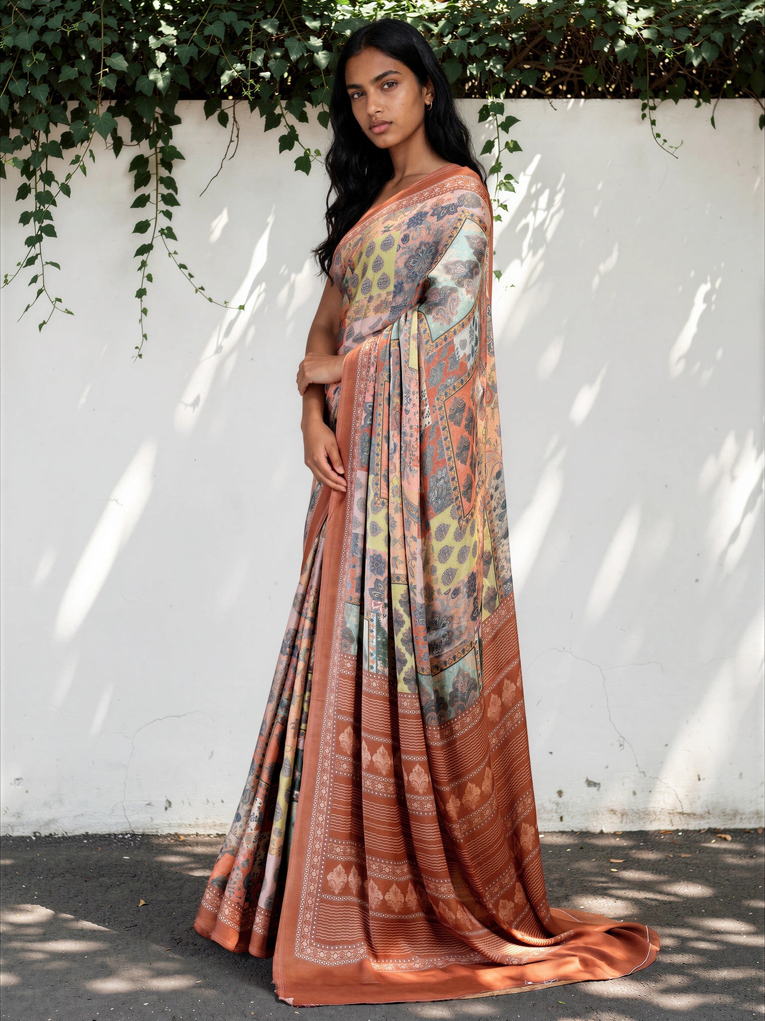 Pastel Green Ethnic Motif Satin Georgette Saree