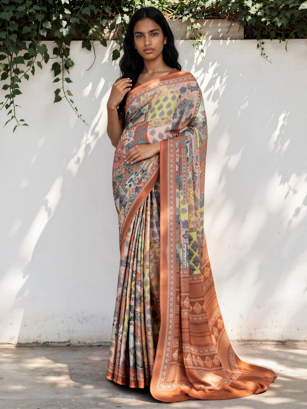 Pastel Green Ethnic Motif Satin Georgette Saree
