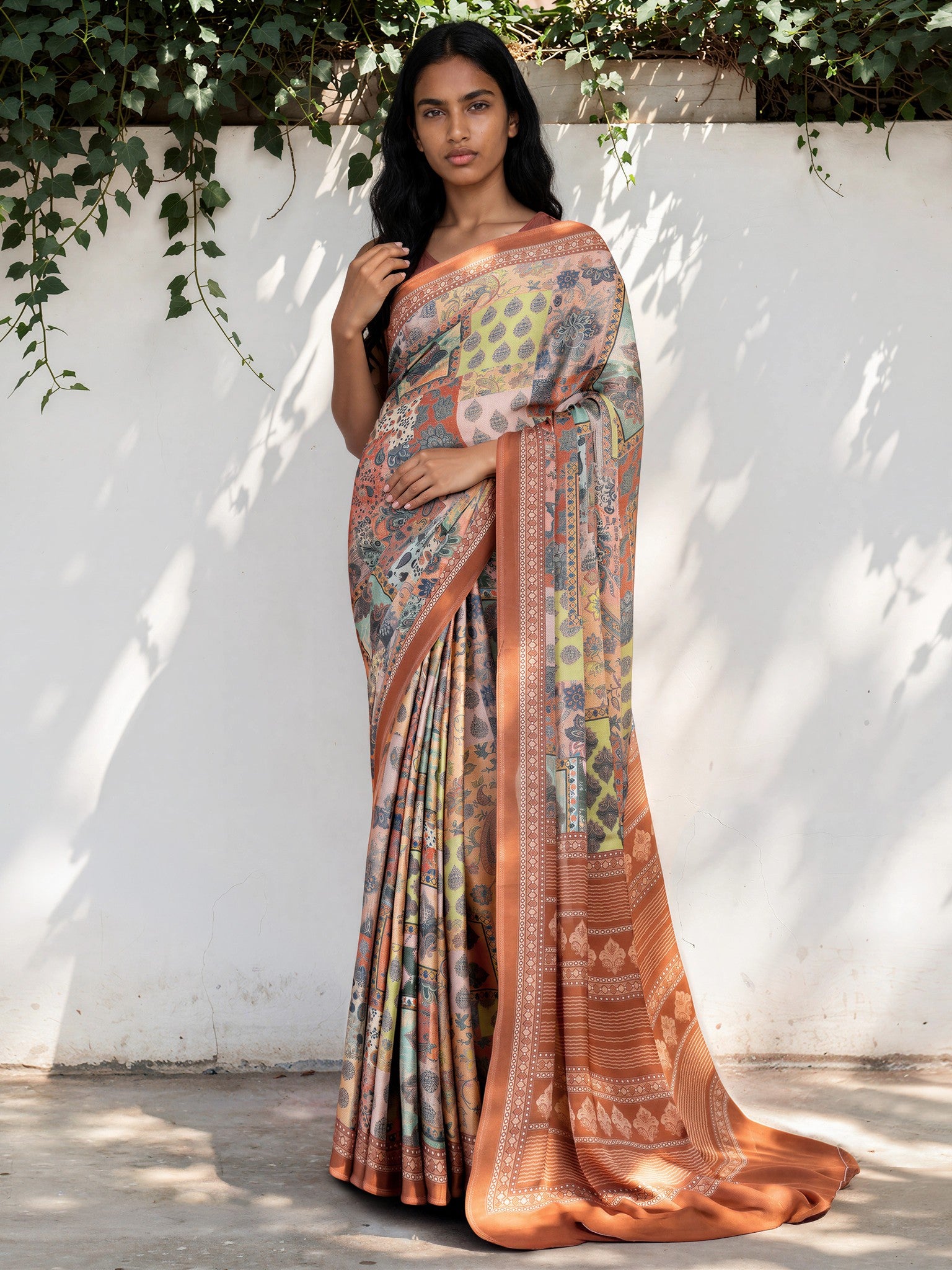 Pastel Green Ethnic Motif Satin Georgette Saree