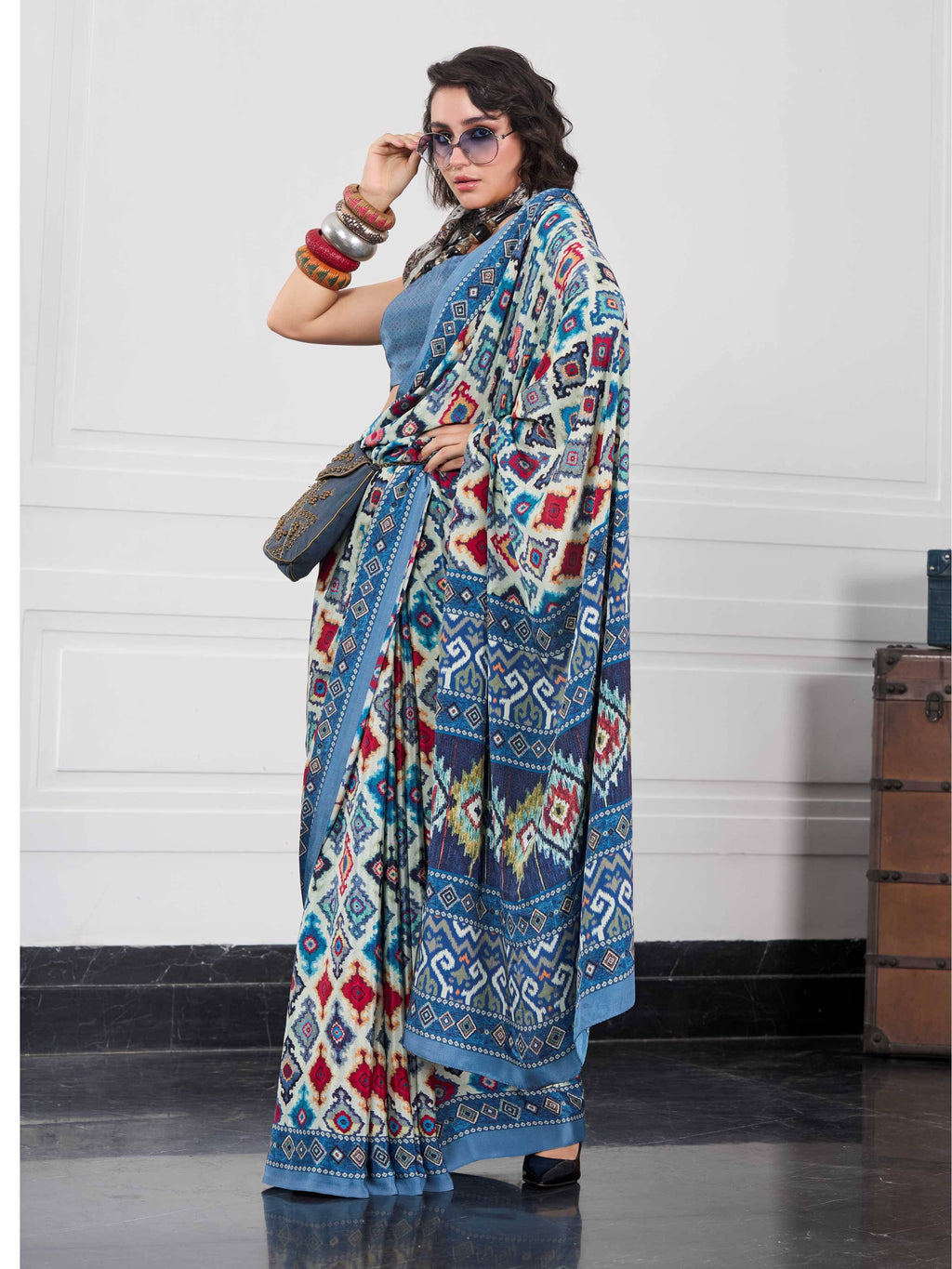 Peacock Blue Ethnic Motif Crepe Silk Saree