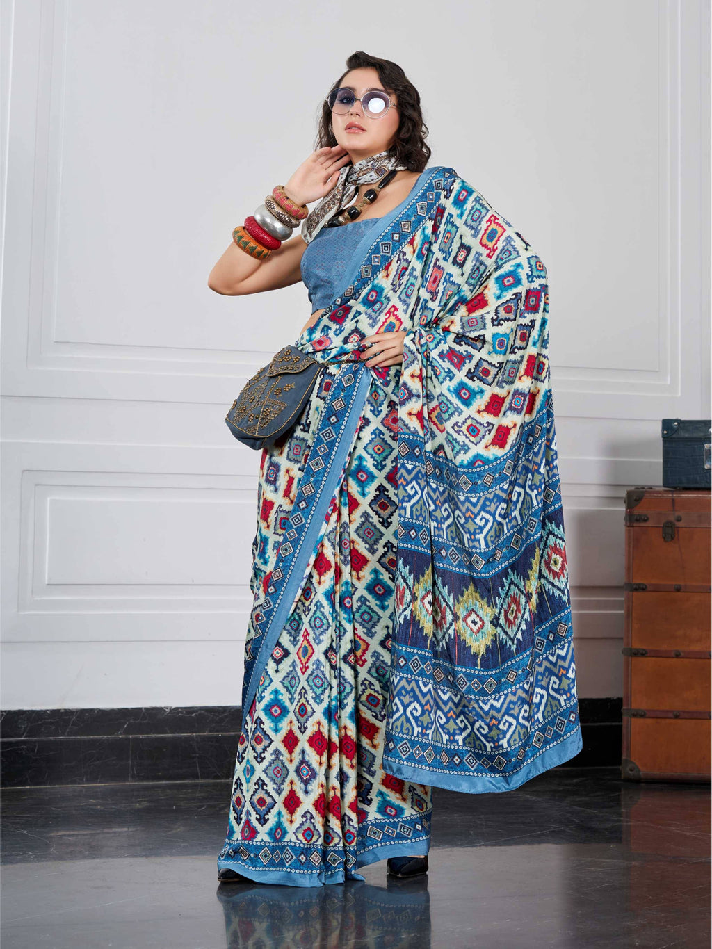Peacock Blue Ethnic Motif Crepe Silk Saree