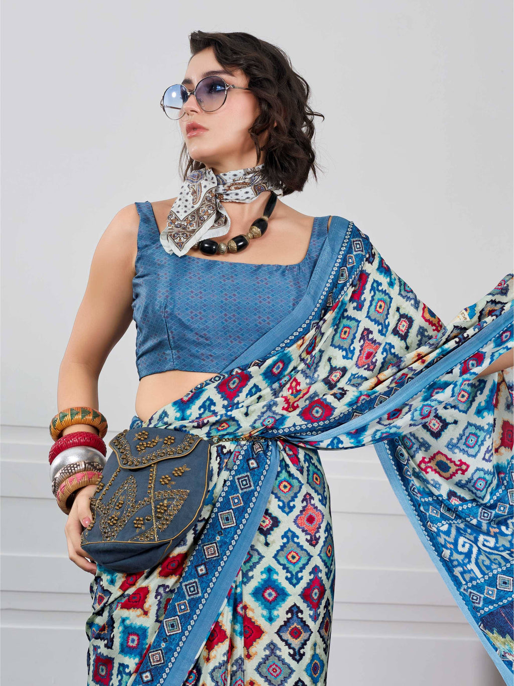 Peacock Blue Ethnic Motif Crepe Silk Saree