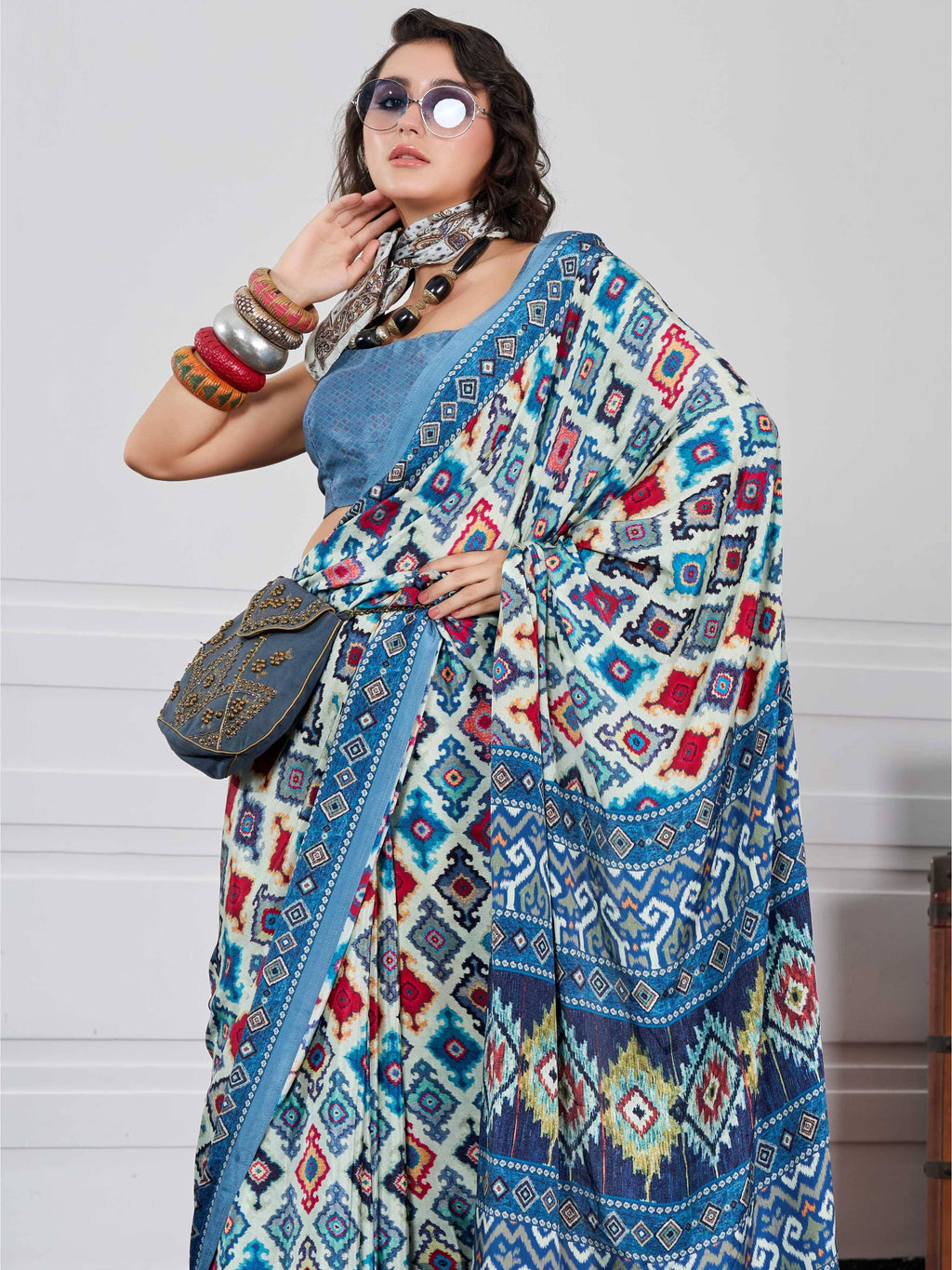 Peacock Blue Ethnic Motif Crepe Silk Saree