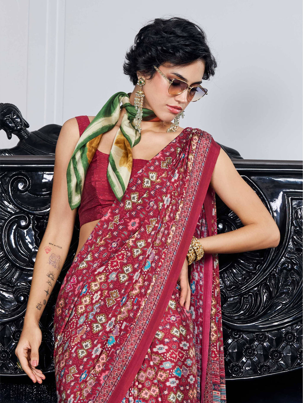 Brick Red Ethnic Motif Crepe Silk Saree
