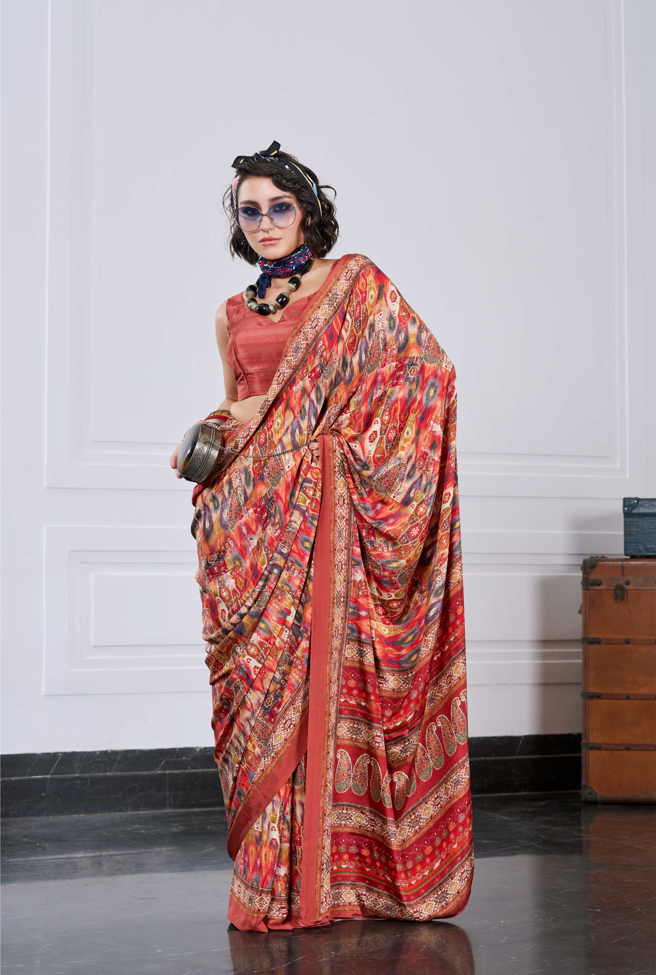 Flow Artistic Motif Burnt Orange Saree
