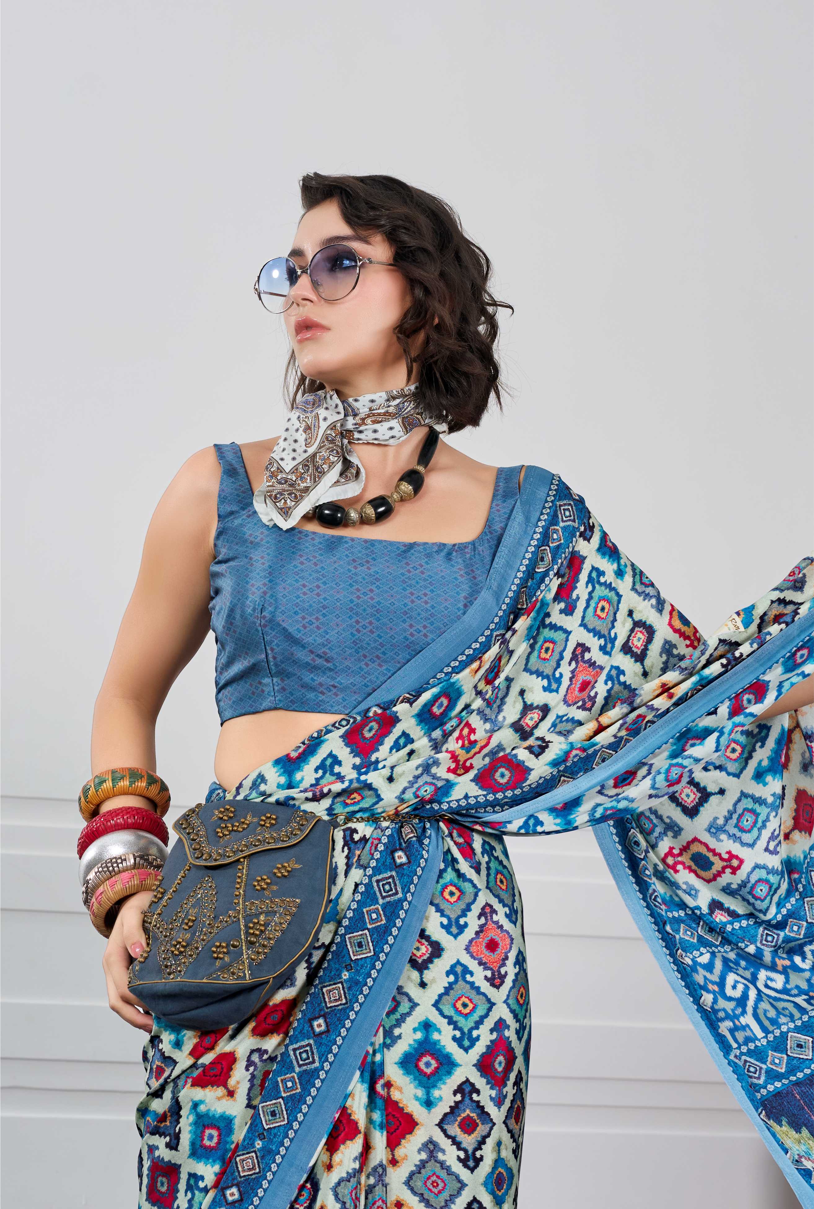 Flow Ethnic Motif Peacock Blue Saree