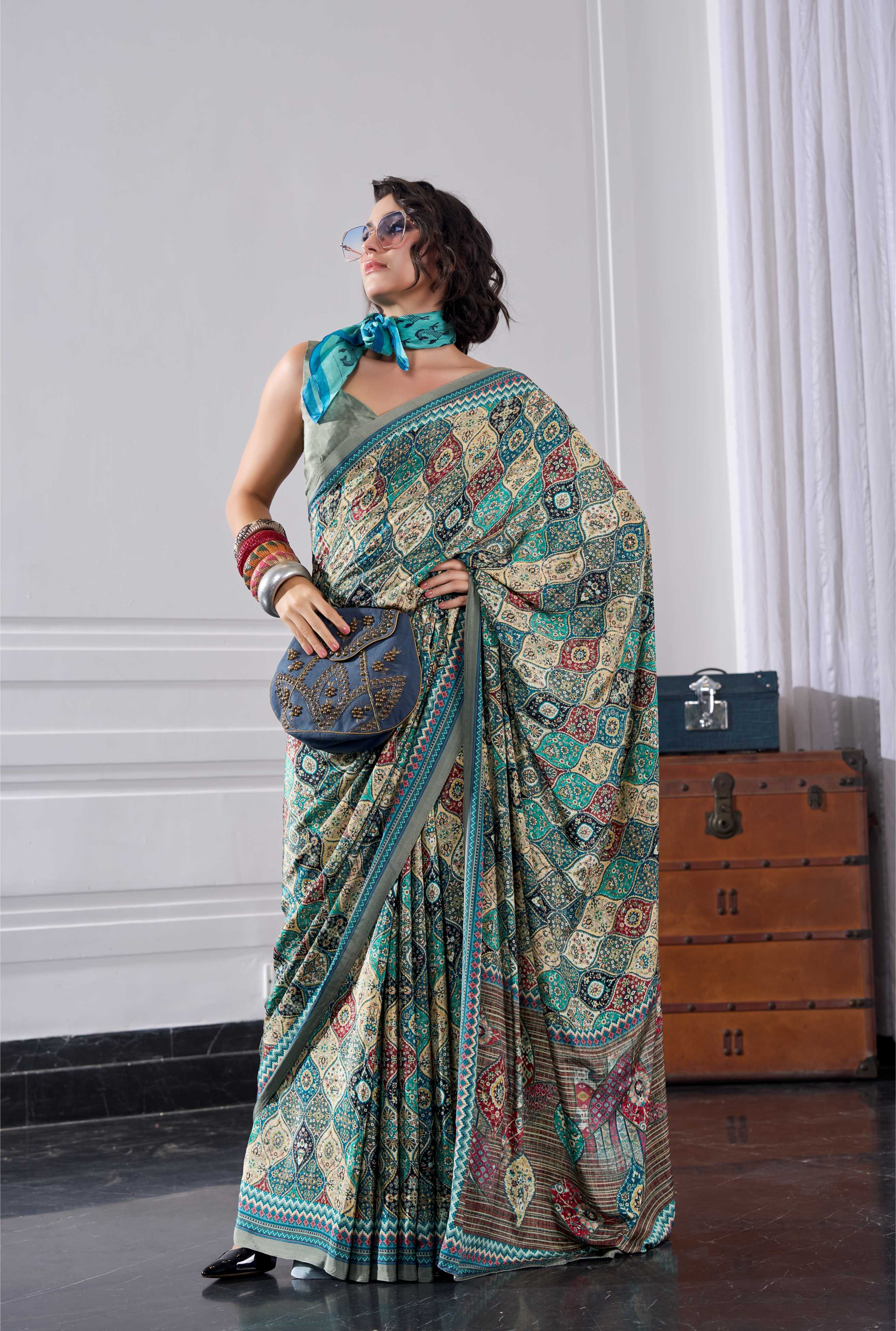 Flow Ethnic Motif Teal Green Saree