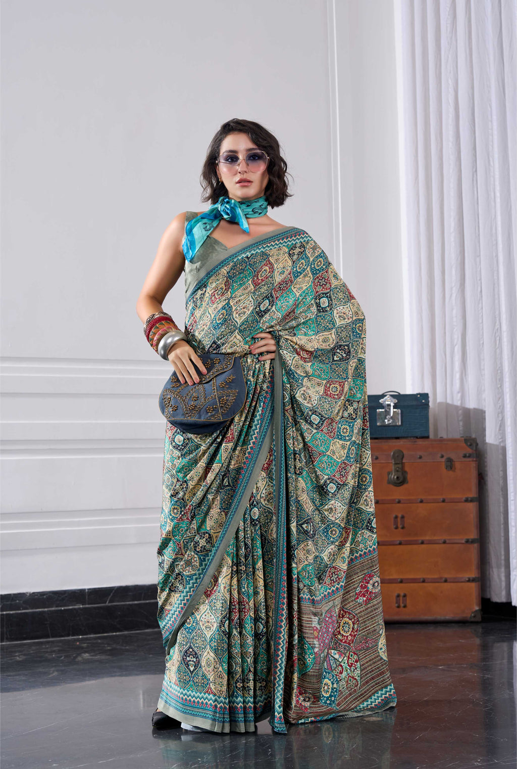 Crepe Ethnic Motif Teal Green Saree